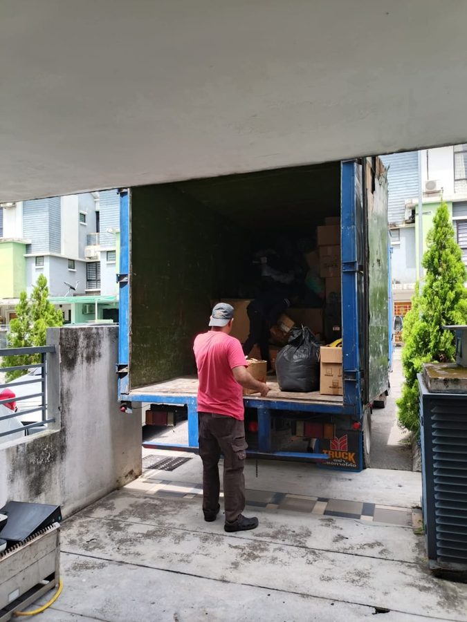 Moving items into lorry